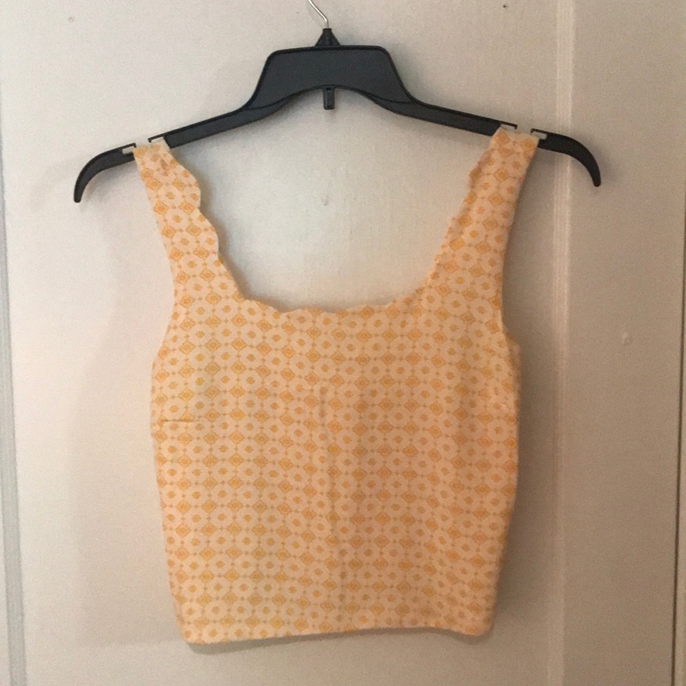 Yellow and white tank